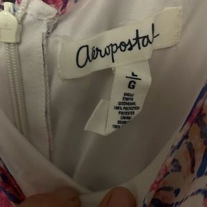 Cute summer dress. Worn one time in great shape. See throw belly.